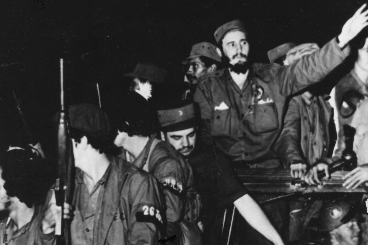 Castro with soldiers of the Rebel Army en route for Havana in 1959. He became prime minister in February of that year.