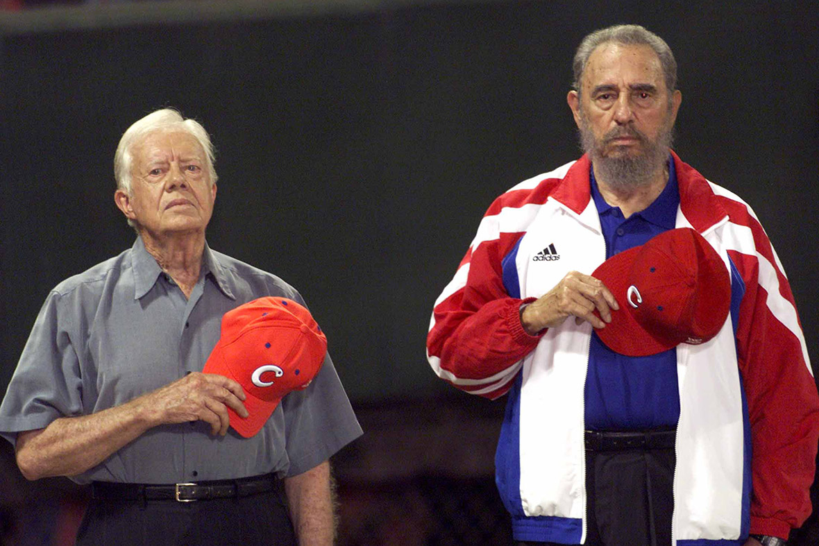14 May 2002: Former US president Jimmy Carter and Castro listen to the Cuban national anthem at the baseball stadium in Havana