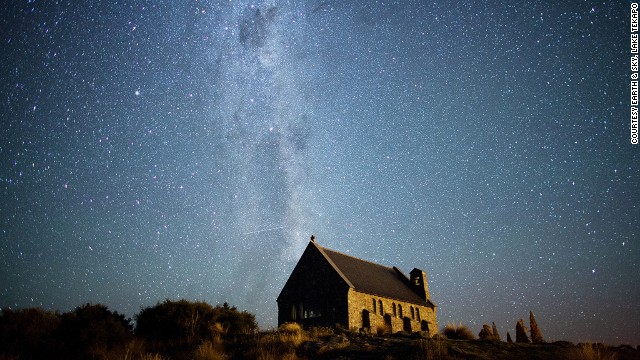 Looking south from Lake Tekapo, on New Zealand's South Island, you can see the Milky Way stretching over the Church of the Good Shepherd. The Southern Cross and the Coal Sack Nebula are visible near the top of the image. 