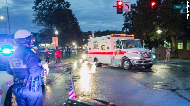 An ambulance transporting Dr. Rick Sacra, an American missionary who was infected with Ebola in Liberia, arrives at the Nebraska Medical Center in Omaha, Nebraska, on Friday, September 5. Sacra was being treated in the hospital's special isolation unit.