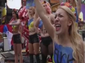 Femen protest Putin in Times Square
