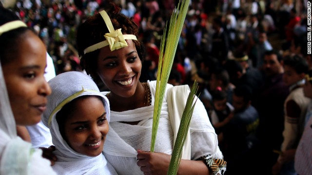 Egyptian Christians celebrate Palm Sunday during a service in the Samaan el-Kharaz Church in the Mokattam district of Cairo, Egypt, on April 13.