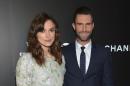 Keira Knightley, left, and Adam Levine arrive at the premiere of "Begin Again" at the Tribeca Film Festival on Saturday, April 26, 2014, in New York. (Photo by Evan Agostini/Invision/AP)