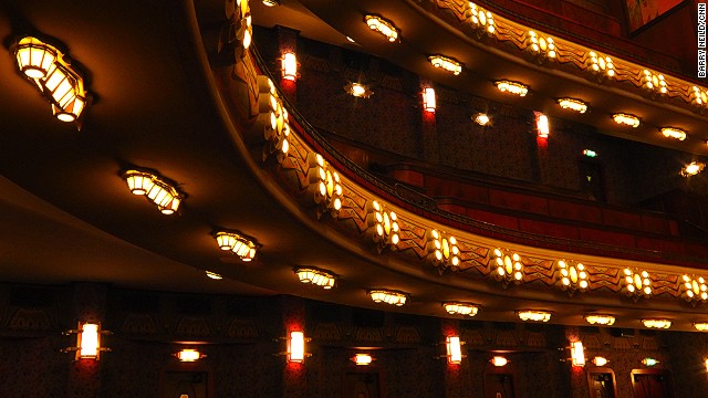 The theater was restored to its former glory in an expensive refurbishment in the 1980s. Lamps on the underside of the balconies seem to resemble caterpillars. 