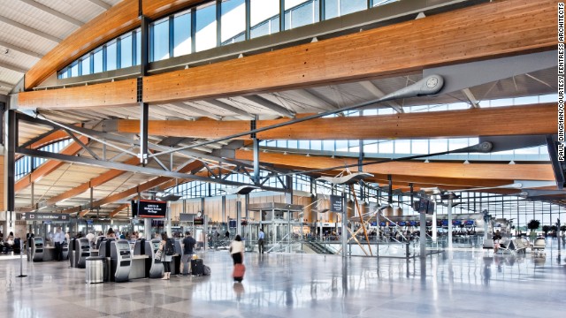 Goldebrger likes Fentress Architects' use of wooden trusses, glass and natural light in their design of the Raleigh-Durham airport's Terminal 2.