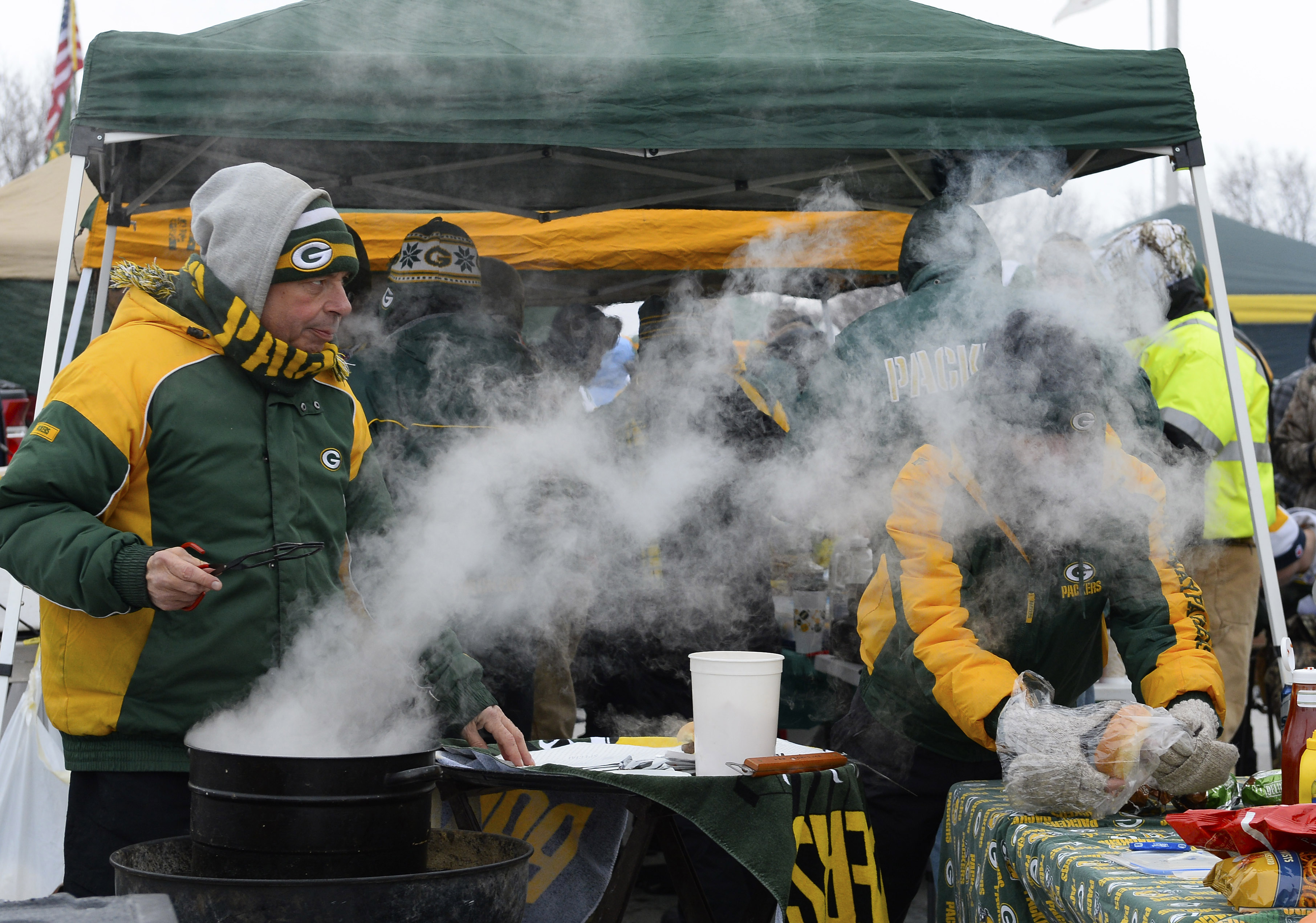 There is no temperature below which these Lambeau fans won't tailgate. (Mike DiNovo-USA TODAY Sports)