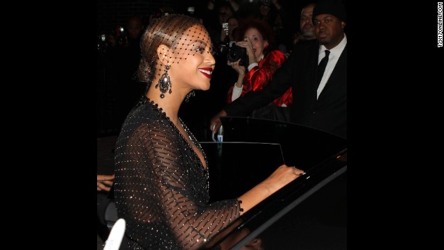 The onlooker also told People magazine that Solange didn't look disheveled but did appear "mad as hell." Beyonce seemed collected, smiling for the crowd outside the hotel. 