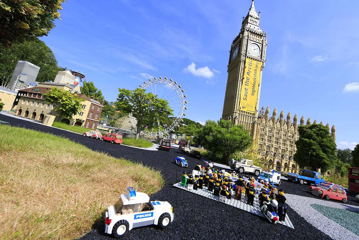 Lego mini figures protest against Shell in front of a model of the Houses of Parliament at Legoland Windsor. The mini protest was staged to draw attention to Shell's Arctic oil exploration and production