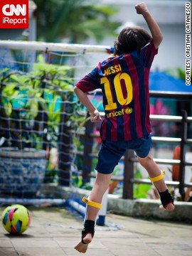 Score! Cristian Catanescu's 9-year-old son celebrates after <a href='http://ift.tt/1wIe5S7'>getting a goal</a> on his family's terrace in Singapore. "Football brings joy to this boy! He changed places and continents several times and his best way to connect to local people is through football," said Catanescu. 