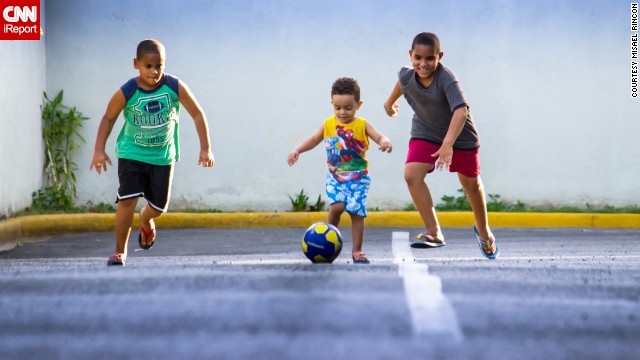Whether you call it soccer or football, this game is beloved around the world. In the Dominican Republic, Misael Rincon's kids and their cousin "have <a href='http://ift.tt/1wIe5S3'>World Cup fever</a>!" Here, they race for the ball outside Rincon's Santo Domingo home. "My kids love the baseball but for a few days here [they] have replaced the bat and glove for a football," he said. Click through the gallery to see more joyful photos that illustrate the world's love affair with soccer.