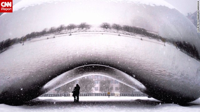 Zahava Hanuka caught this rare, empty scene at Millennium Park. "There was the most romantic couple standing <a href='http://ift.tt/1qOMGuV'>underneath the Bean</a>, just there for me to shoot a chance of a lifetime shot," she said.