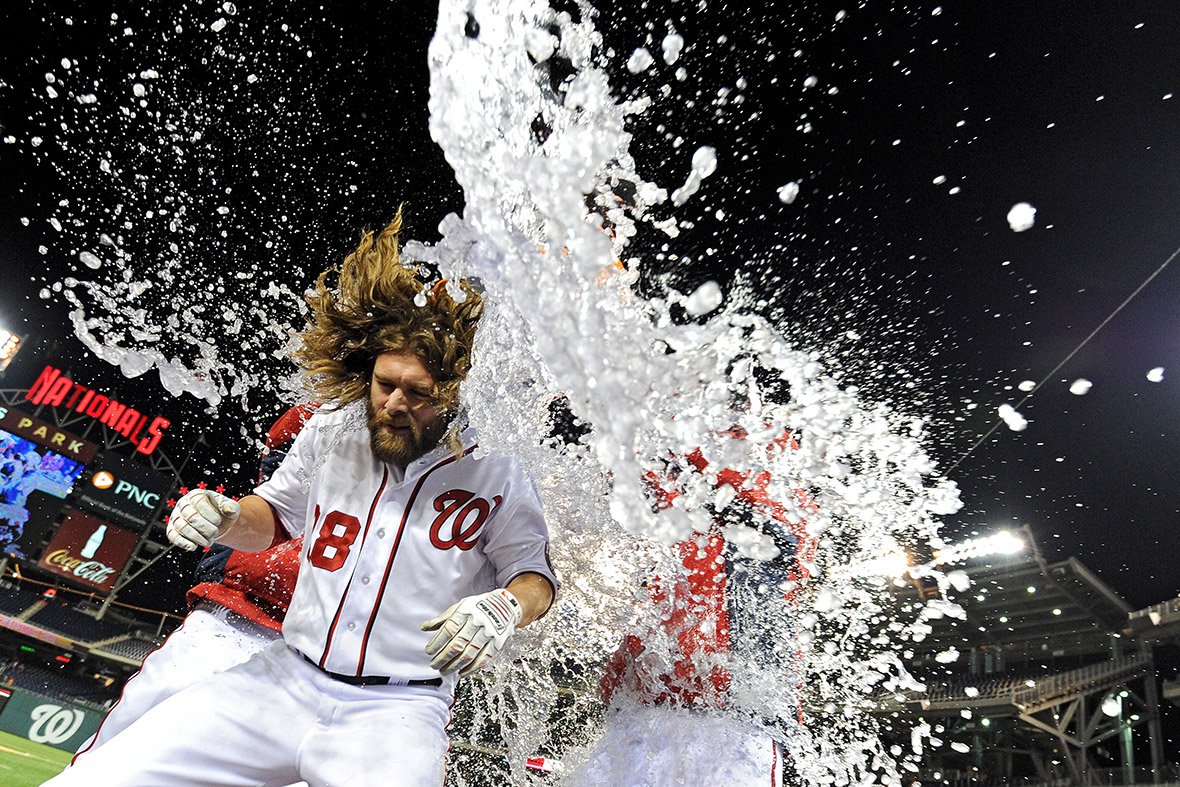 Jayson Werth of the Washington Nationals is doused with water by team-mates during a baseball game against the Los Angeles Angels in Washington, DC