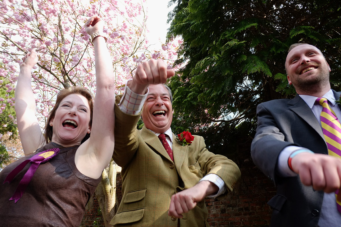 Ukip leader Nigel Farage shares a joke with his party's candidates Mandy Boylett and Mark Chatburn during a visit to Yarm, Stockton-on-Tees