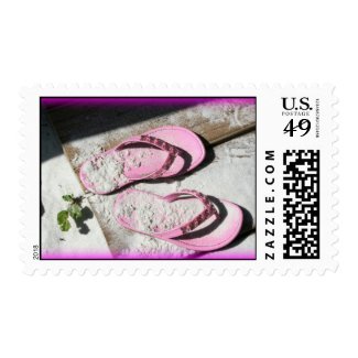Pink sandy flip flop sandals on Florida beach Postage Stamps