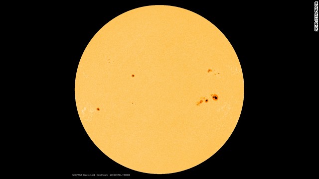 Those spots on our sun appear small, but even a <a href='http://ift.tt/1cumHz8' target='_blank'>moderate-sized spot is about as big as Earth</a>. They occur when strong magnetic fields poke through the sun's surface and let the area cool in comparison to the surrounding area.
