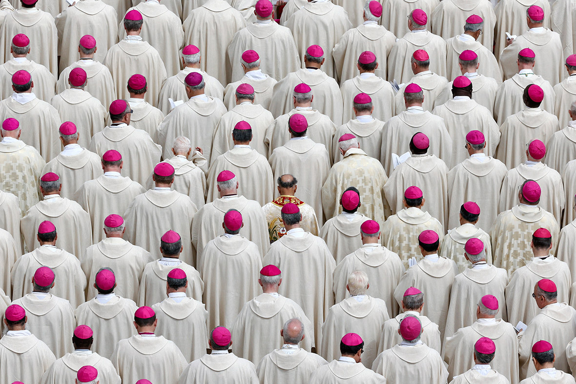 Bishops attend a canonisation mass in St Peter's Square at the Vatican where John XXIII and John Paul II were proclaimed saints in front of hundreds of thousands of pilgrims.