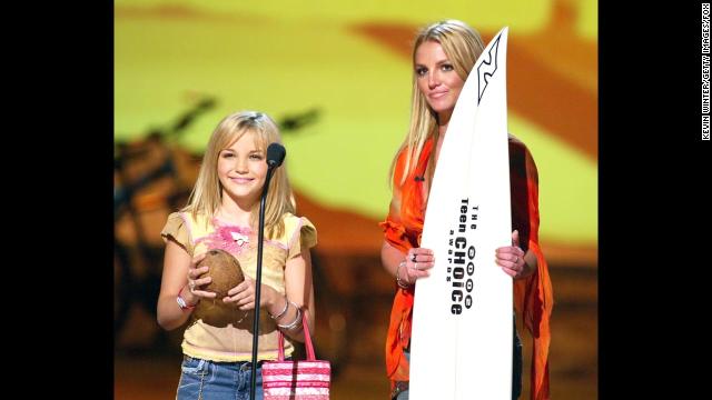 Britney Spears and her younger sister, Jamie Lynn Spears, appear at the Teen Choice Awards 2002 at the Universal Amphitheatre in Los Angeles.