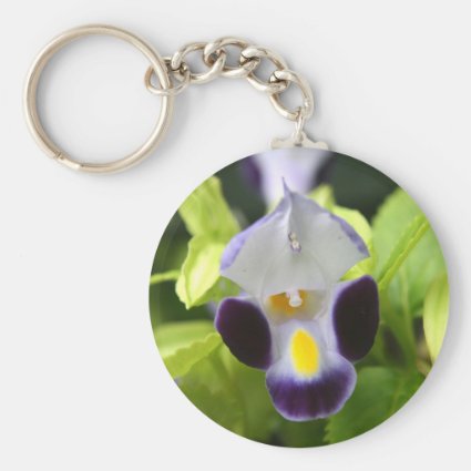 white and purple flower close up keychain