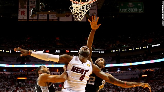 James competes against the San Antonio Spurs during the NBA Finals in June. The Spurs won the series and prevented the Heat from winning three straight titles.