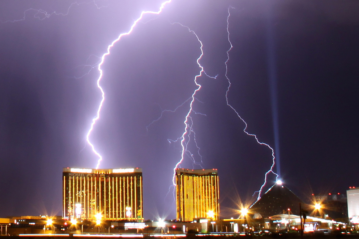 Lightning strikes the Mandalay Bay Resorts and Casino and Luxor hotels in Las Vegas, Nevada