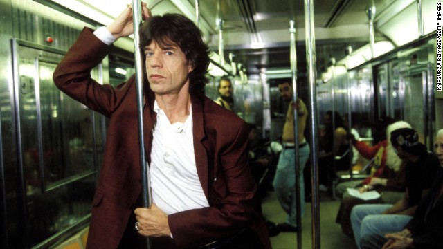 Mick Jagger has his picture taken on a subway in New York in 1997.