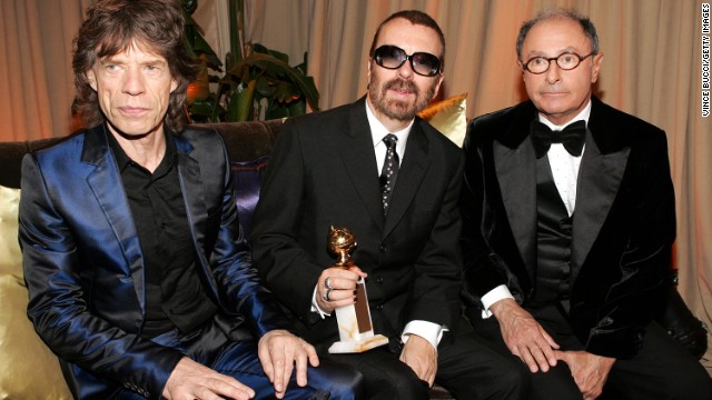 Mick Jagger, David A. Stewart and Variety editor-in-chief Peter Bart attend a 2005 Golden Globes after-party at Trader Vics in Beverly Hills, California. In 2011, Jagger and Stewart, best known for his work with the Eurythmics, formed a supergroup called Super Heavy with Joss Stone, Damian Marley and A.R. Rahman.