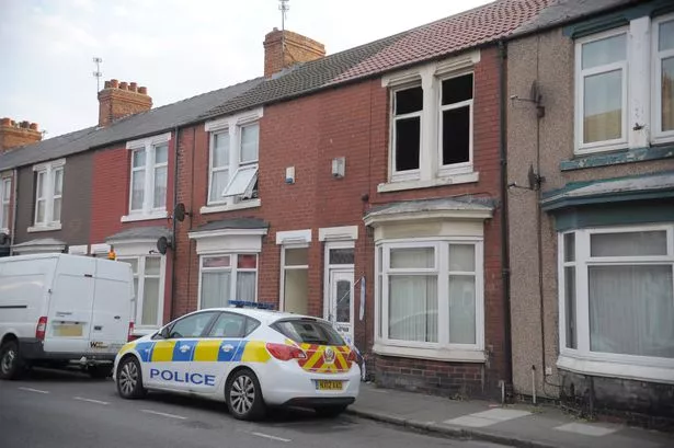 Police at Charlotte Street in Redcar after a fire