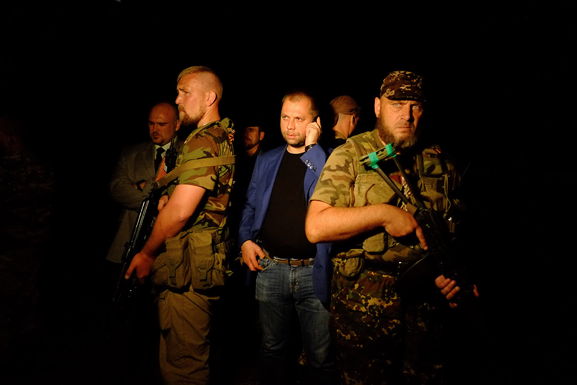 Alexander Borodai, self-proclaimed Prime Minister of the pro-Russian separatist Donetsk People's Republic, arrives at the site of the crash.