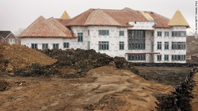 Home construction in Inverness, Illinois, in 2006. The collapse of the housing bubble instigated a credit crisis that triggered the global financial meltdown of 2007. 