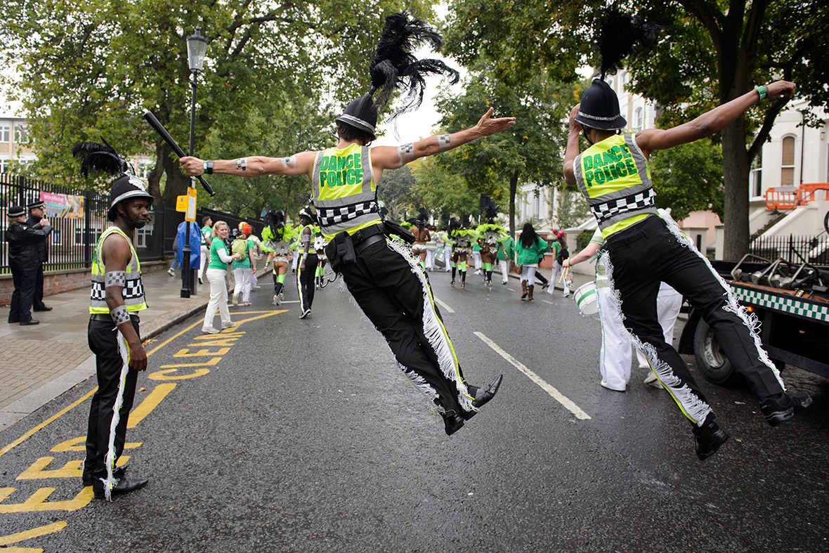 Performers take part in a parade on the second day of the Notting Hill Carnival in London