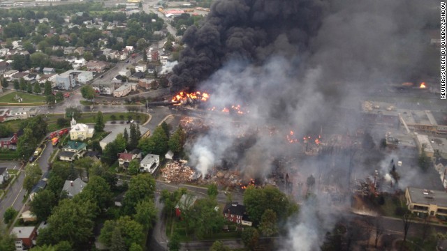 Smoke billows from a fire at the site of a train derailment on Saturday, July 6.