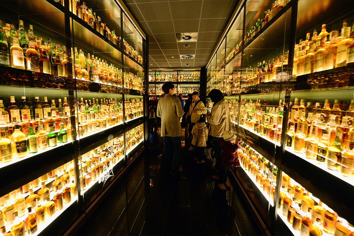 People visit the Diageo Claive Vidiz Collection, the world's largest collection of Scottish Whisky, on display at The Scotch Whisky Experience in Edinburgh