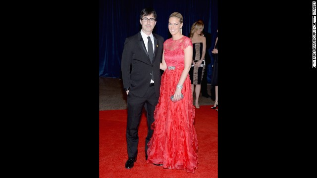 John Oliver, from "The Daily Show," and his wife Kate arrive.