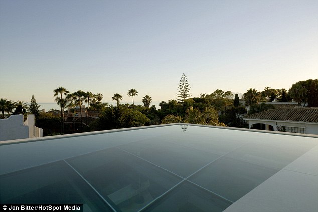 Infinity edge: The glass-bottom pool boasts stunning views across the Mediterranean
