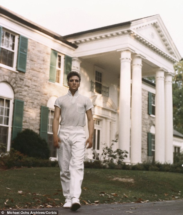 Elvis is pictured outside Graceland in 1957