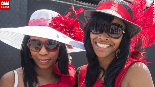 Big glasses, big hats and big smiles. The derby is also referred to as "The Run for the Roses" for the <a href='http://ift.tt/RbeKf5'>garland of 554 red roses</a> draped over the winner.