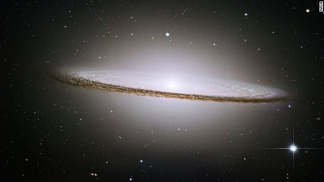 The <a href='http://ift.tt/1lYuGyg' target='_blank'>Sombrero Galaxy</a> can be seen with an amateur telescope from Death Valley National Park in California. This image is a mosaic of six photos taken by the Hubble Space Telescope. Many astronomers speculate that a black hole a billion times the mass of our sun is at the "Mexican hat's" center. 