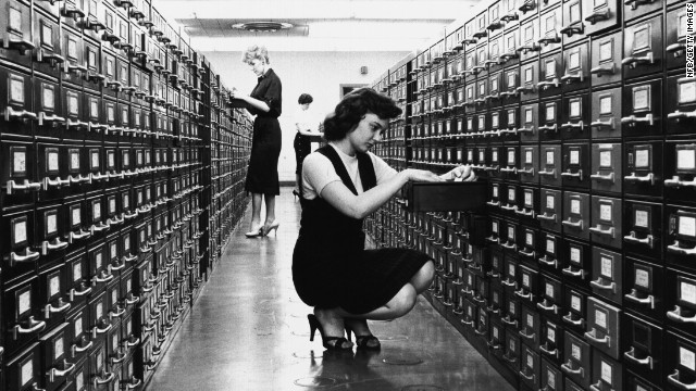 Then: The card catalog was a formidable piece of furniture found at every library. On its thousands of cards: title, author, subject and call number -- sometimes with handwritten notations. Now: Google. The world's knowledge at your fingertips. So much for roaming the aisles of the <a href='http://ift.tt/1nXUR6T' target='_blank'>Dewey Decimal System</a>.