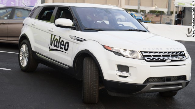 A Range Rover Evoque equipped with Valeo self-parking technology backs into a parking spot during a <a href='http://ift.tt/LTyT7s'>driverless car demo at the International Consumer Electronics Show</a> (CES) in January. 