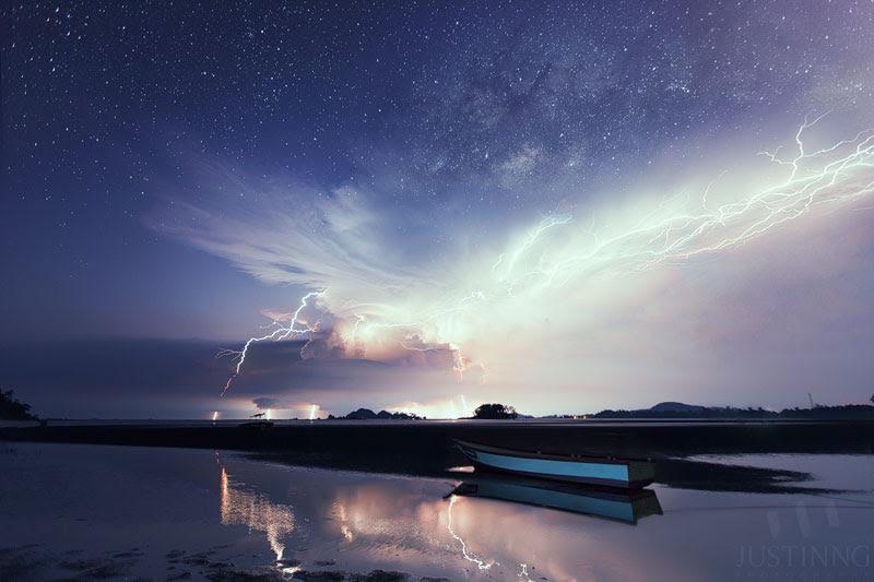 Milky Way rising above spectacular lightning display