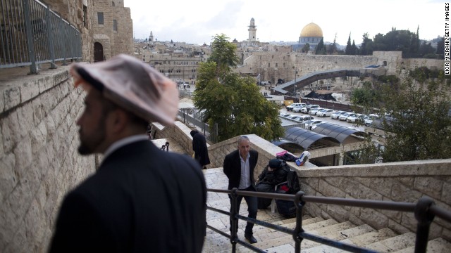Israelis walk at the Jewish quarter in the Old City overlooking the Temple Mount on October 31. <a href='http://ift.tt/1wKKCIu'>The Temple Mount</a> is the holiest site in Judaism and the third-holiest site in Islam.