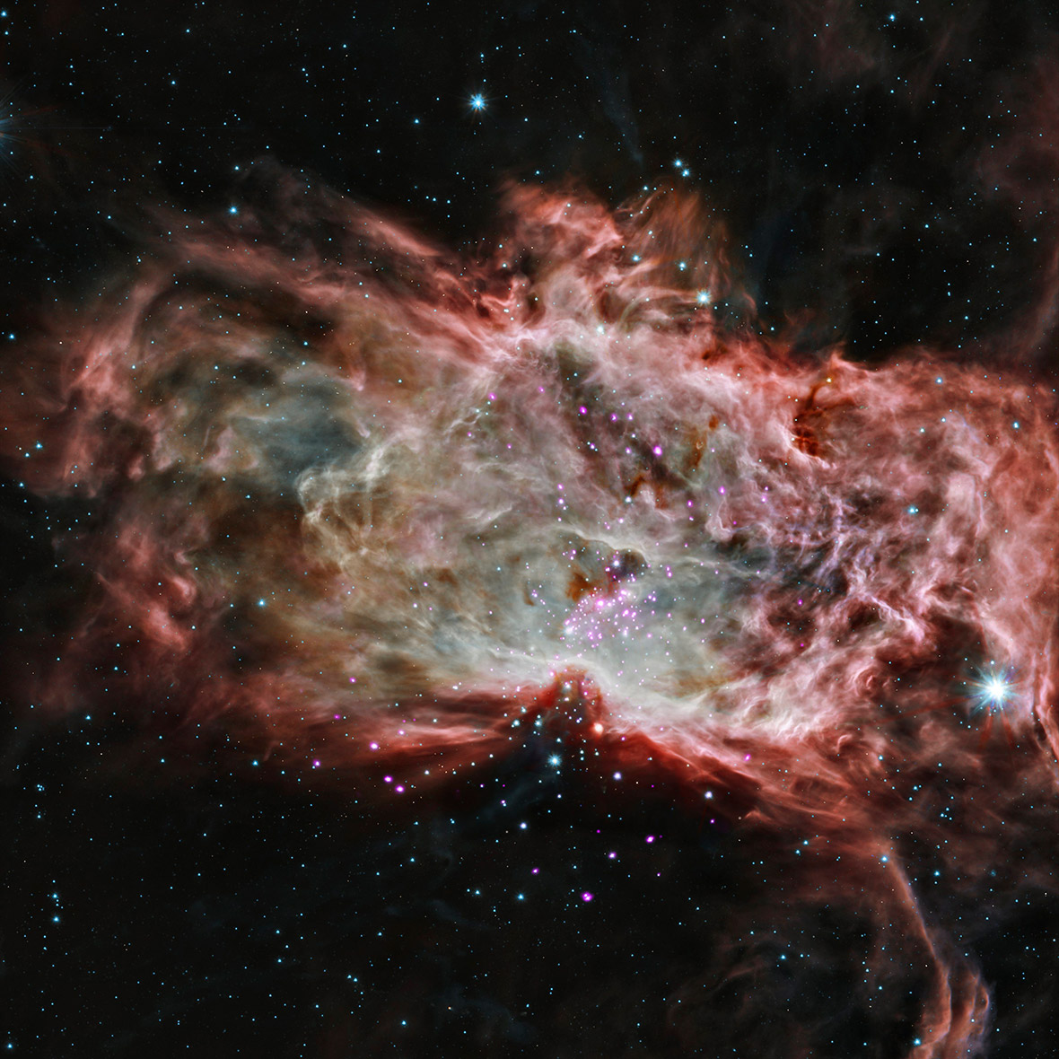 This NASA composite image shows the NGC 2024 cluster at the centre of the Flame Nebula, about 1,400 light years from Earth.