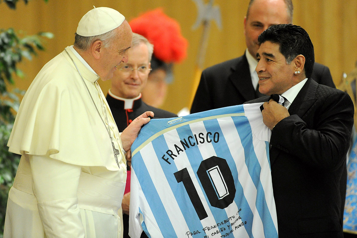 Diego Maradona gives Pope Francis an Argentina football shirt during an audience before the Inter-religious Match For Peace in Rome