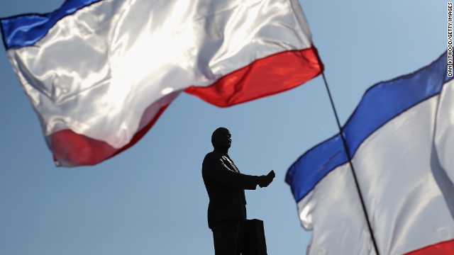 Russian flags wave in front of a monument dedicated to Soviet Union founder Vladimir Lenin during a pro-Russian rally in Lenin Square in Simferopol on March 15.