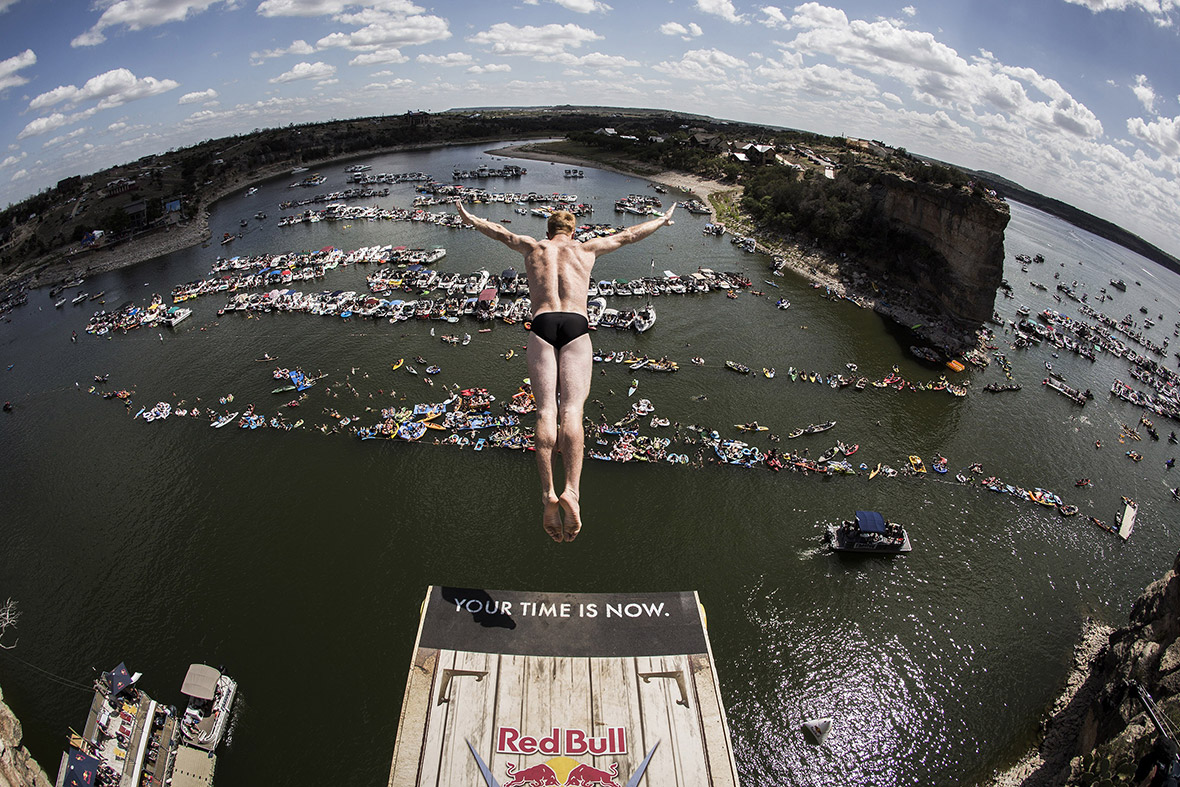 Andy Jones of the USA dives from the 28-metre platform at Hells Gate during the second stop of the Red Bull Cliff Diving World Series at Possum Kingdom Lake, Texas
