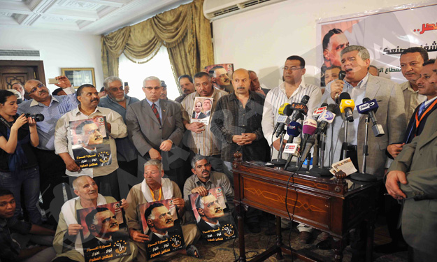 بالصور-عمال مصر يستلهمون روح عبدالناصر في عيدهم