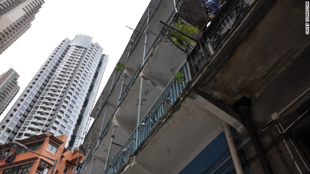 The Blue House, which has architecturally significant balconies, is just a few blocks from fancy new highrises that have sprung up in Hong Kong over the last two decades.