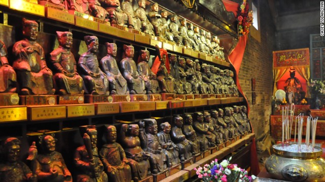 Small statues line the walls at Pak Tai Temple.