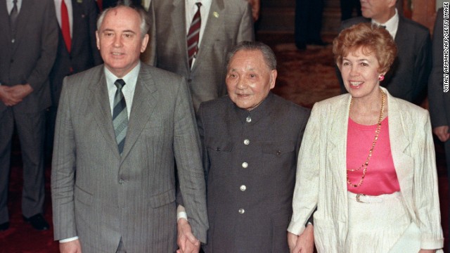 May 16, 1989, then Chinese President Deng Xiaoping (center) takes then Soviet President Mikhail Gorbachev and his wife Raisa by the hand at the Great Hall of the People. Gorbachev's visit coincided with the student hunger strikes, forcing the official reception to be moved from Tiananmen Square to the airport -- embarrassing for the Chinese leadership.
