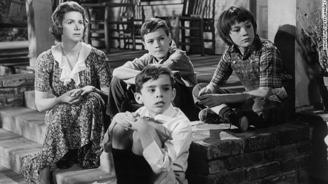 Rosemary Murphy, left, sits with Mary Badham, top right, and other children in a scene from the film 